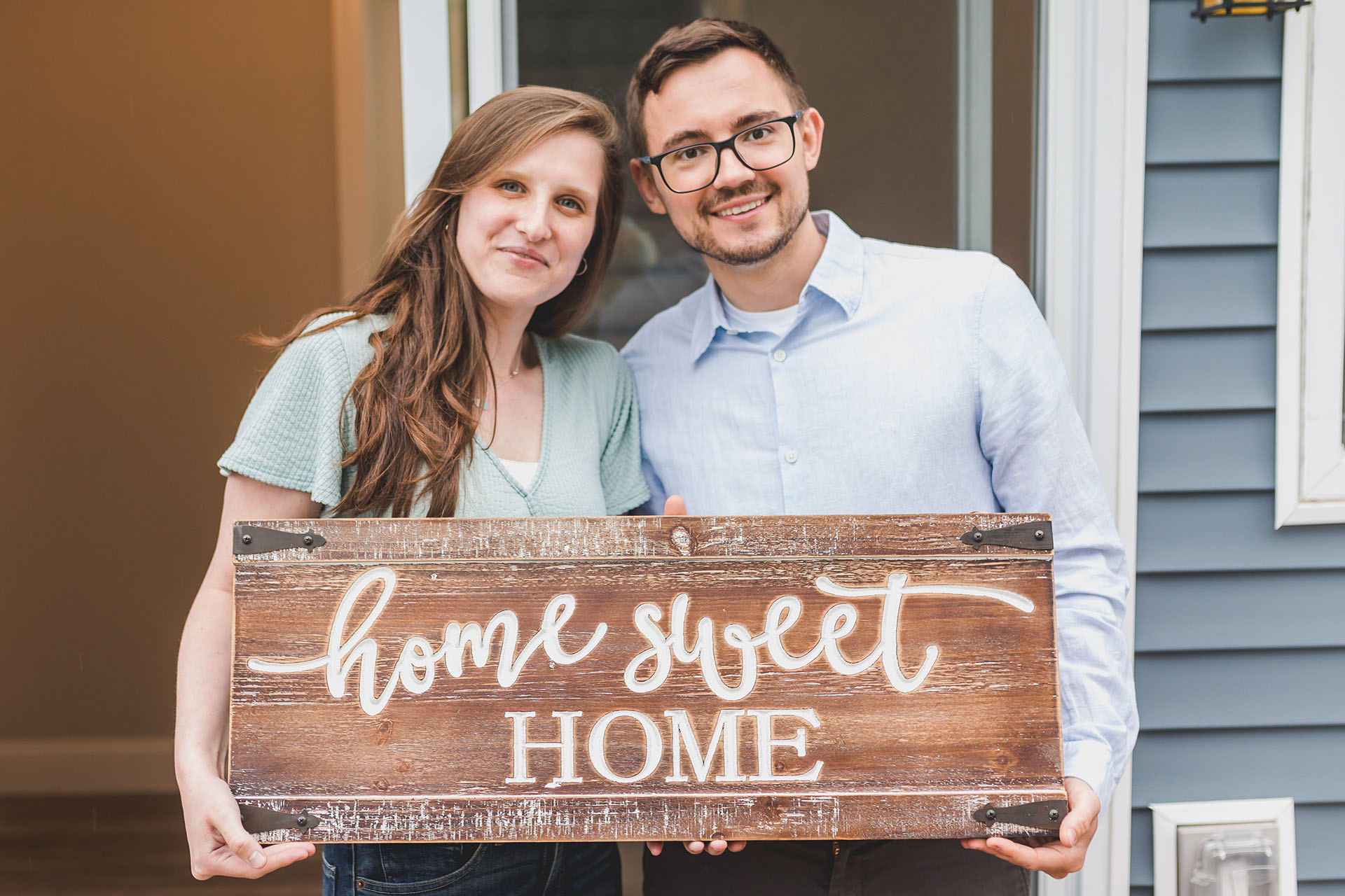 Young couple moving into their new home