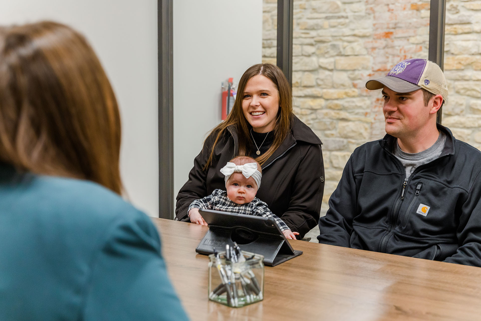 First time home buyers meet with RailTrust Mortgage.