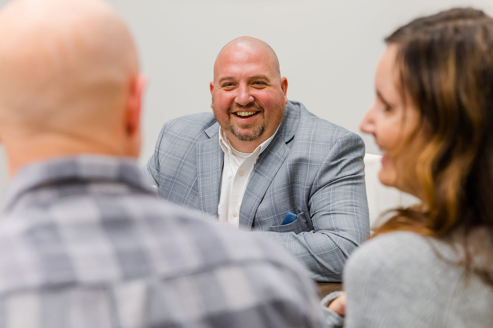 RailTrust Mortgage loan officer smiling at new client